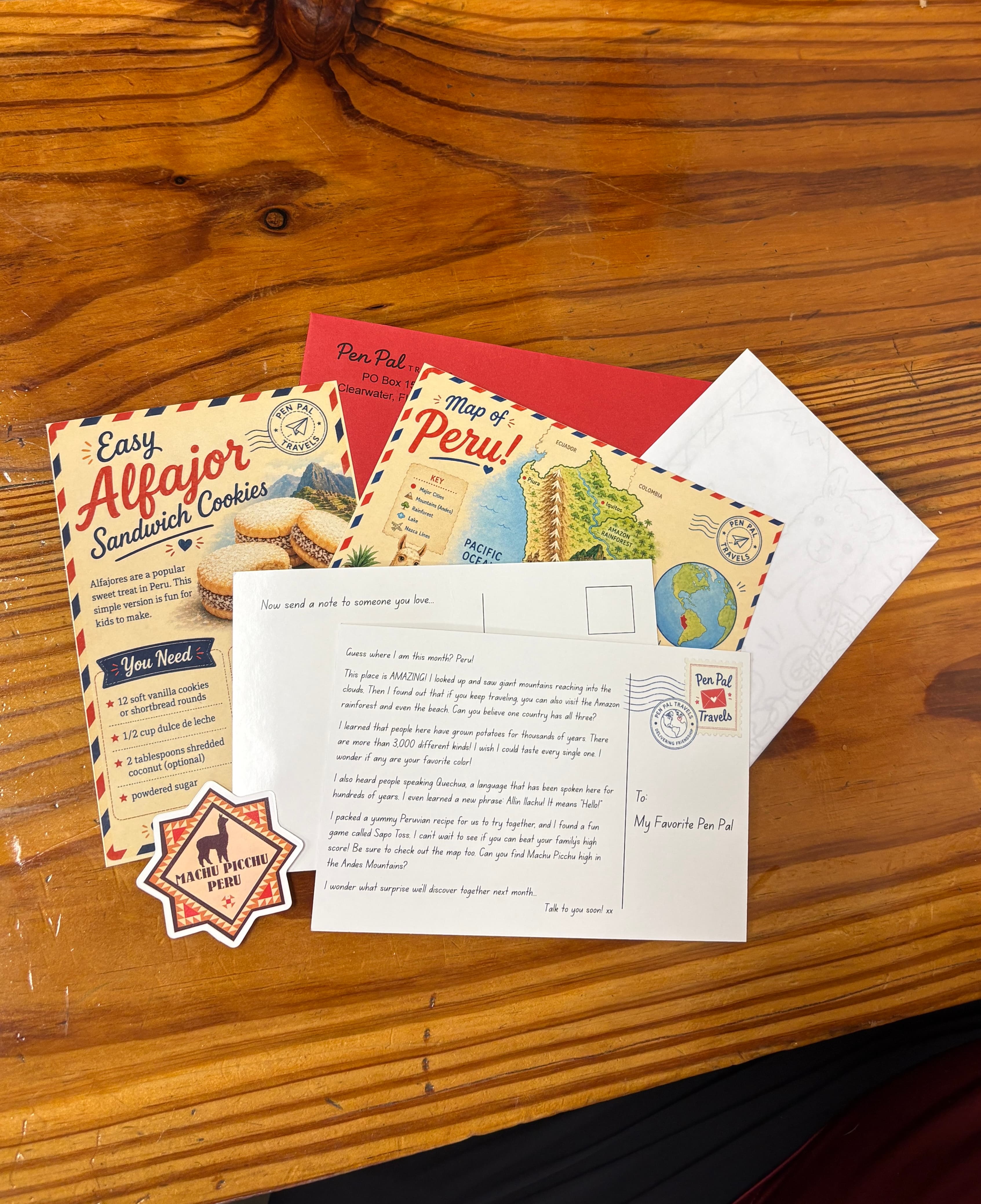 A Pen Pal Travels Peru mailing with postcards, map, recipe, and sticker